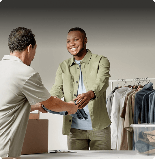 Woman holding packages in warehouse